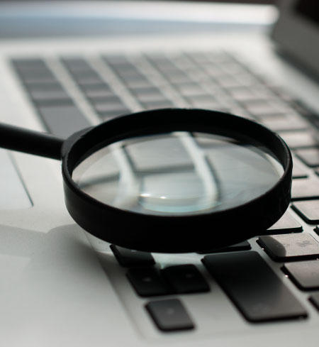 Magnifying glass on a keyboard